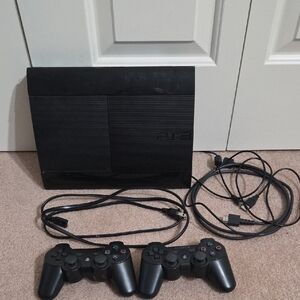 Sony PlayStation Console with Dual Controllers - Extra Cords